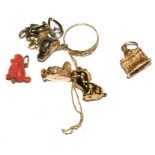 A collection of gold charms etc
