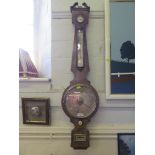 An early 19th century mahogany banjo barometer with swan-neck pediment, hygrometer, thermometer