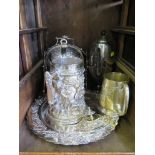 A silver plated jug decorated with children in high relief, a plated muffin dish, a tankard, etc