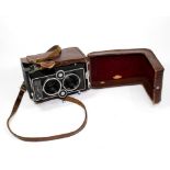 A Rollei Magic TLR camera, with Xenar 1:3.5/75 lens, body no 2509300 with leather case