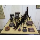 Oriental carved hardwood stands: Nest of four legged stands, four circular, one square and ten