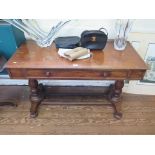A mid Victorian mahogany hall side table, the top with frieze drawer on baluster turned supports