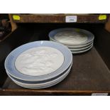 Eight Lladro relief moulded plates, commemorating Christmas and Mother's day