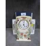 A Moorcroft Trellis clock, numbered 133/300 with certificate and box 15.5cm high