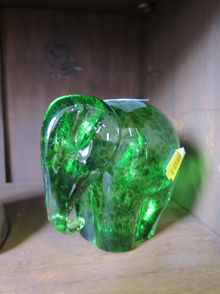 A Wedgwood speckled green glass paperweight sculpture of an elephant, stamp to base