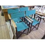A set of four canvas folding outdoor chairs