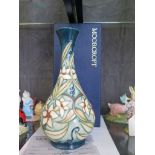 A Moorcroft vase from the Carousel series, with daffodil design, designed by Rachel Bishop