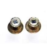 Two 9 carat gold and sapphire set studs