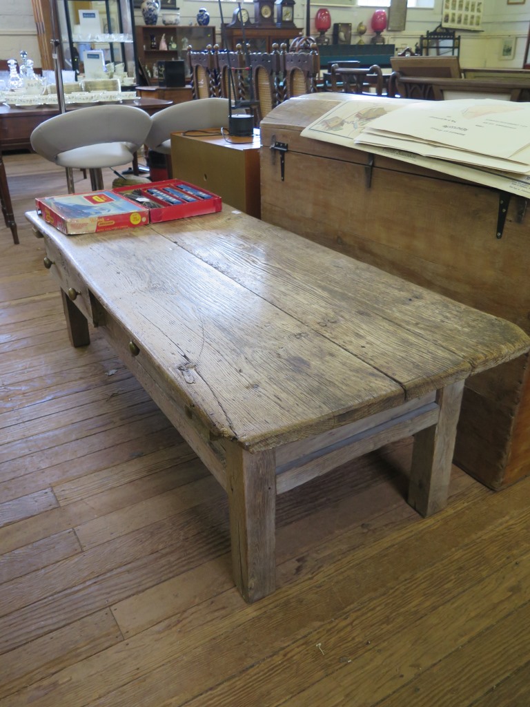 A driftwood coffee table, with two frieze drawers, 170cm wide, 68cm deep, 50cm high