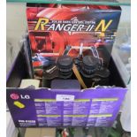 A 2 channel Ranger II N radio control unit, two other accessories and a pair of Pathescope 10 x 50