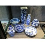 A Chinese floral cylindrical vase 25.5cm high, three Chinese blue and white saucers and other blue