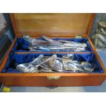 A collection of silver plated cutlery, eight dinner forks, eight dinner knives, eight dessert forks,