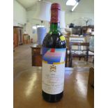 A bottle of 1984 Chateau Mouton Rothschild Pauillac