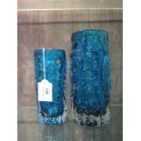 A large Whitefriars glass Bark effect cylindrical vase, in kingfisher blue, designed by Geoffrey