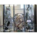 A matced pair of Whitefriars knobbly design vases, in streaky glass 23.5cm and 24cm high, and