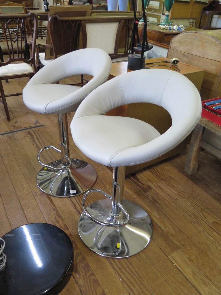 A pair of chrome adjustable high stools with grey leatherette upholstery (2)