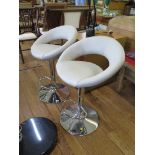 A pair of chrome adjustable high stools with grey leatherette upholstery (2)