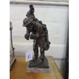 After Oscar Hertel, a bronze figure of a busker with a monkey ('Gaukler') 33cm high