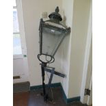 A Victorian oxidised copper street lantern, on a later wrought iron bracket, lantern 84cm wide,