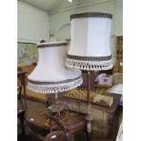 A marble effect table lamp, with spiral support and griffin feet, and a similar standard lamp (2)