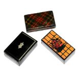 Three snuff boxes to include tartan ware