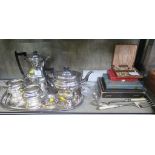 A silver plated tray, a four piece silver plated tea set, etc