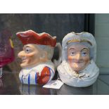 A pair of Victorian Punch and Judy character mugs, 12cm high