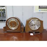 A 1930s oak mantel clock with three train movement striking on gongs 22cm high, and another mantel