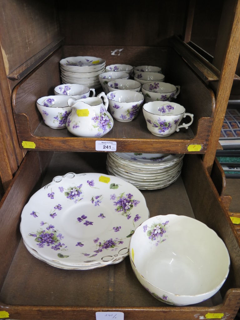 A Hammersley & Co part tea service, with purple floral decoration (34 pieces)