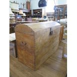 A pine domed lid chest, with brass side handles, 116cm wide, 89cm high