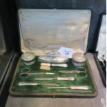 A lady's silver vanity set in original case