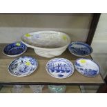 An English 18th century blue and white 'Chinese House' pattern saucer 12.5cm diameter, a Chinese