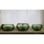 Three Whitefriars ovoid lobed design glass bowls in sea green, James Hogan design 28cm, 26cm and