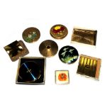 A collection of eight lady's compacts, to include Stratton, Vogue, etc