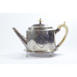 An 18th century silver tea pot and matching tea pot stand, on four feet, both tea pot and stand
