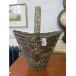 A Dutch brass helmet-shaped Tulip bucket 45cm high