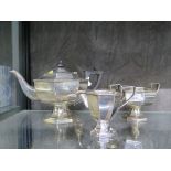 A three piece silver plated tea set