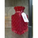 A Whitefriars glass chess board design vase in ruby red, designed by Geoffrey Baxter 14.5cm high