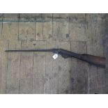 A Victorian air rifle, as found, barrel 40.5cm long