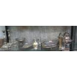 A collection of silver plated items to include a coffee pot, a toast rack, a small tray, etc (9)