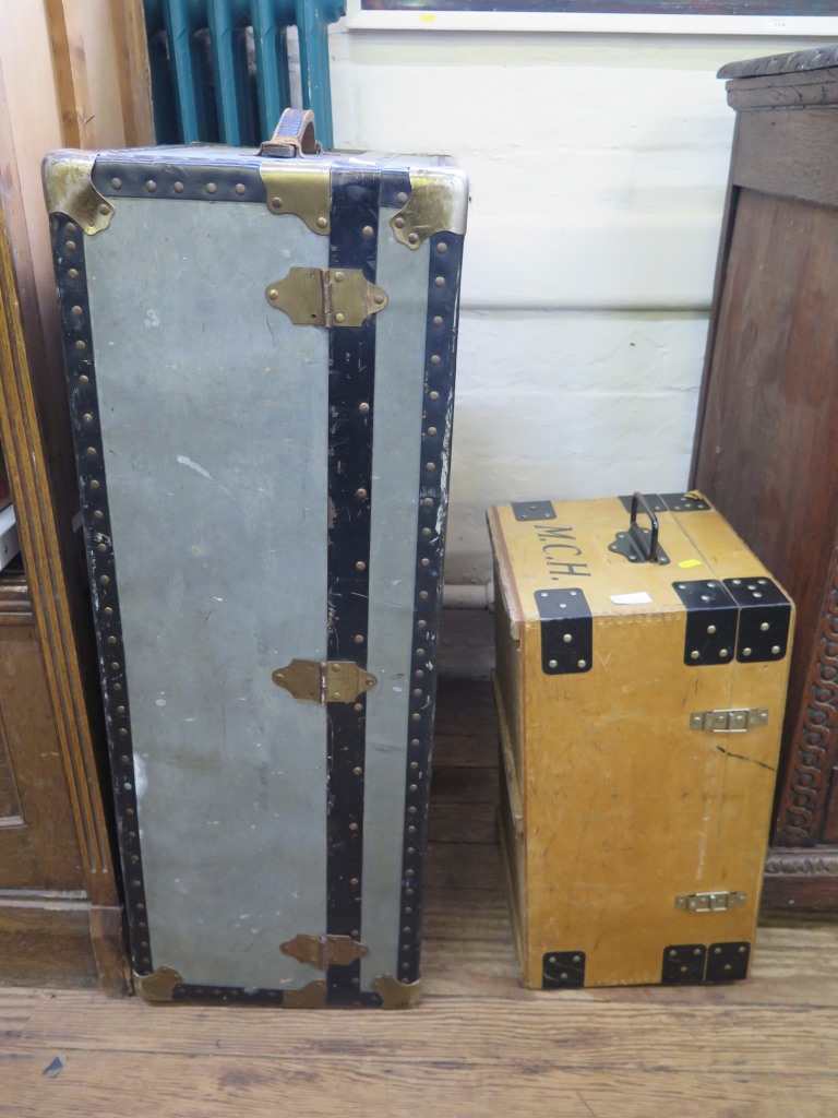 A metal bound school trunk and a tuck box