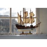 Hand made and painted wooden replica model of pilgrims ship 'Mayflower' with sails and stand on a