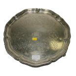 A large round plated tray