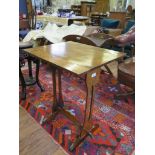 A small walnut table with slim drop sides, 53.5cm long, 46cm wide, 70cm high