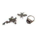 A silver and marcasite brooch in the form of a frog, another in the form of a fly and a ring (3)