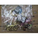 A small bag of costume jewellery