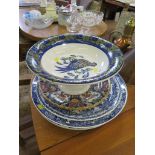 A Delft charger depicting a fisherman, 38cm diameter, a Booths British scenery charger, a Makkum