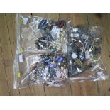 Two large bags of costume jewellery and a bag of watches
