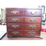 A Japanese hardwood jewellery box with brass mounts and four long fitted drawers 35.5cm wide 30.