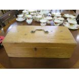 A pine box, with brass lid handle, 47cm long, 22cm wide, 15.5cm deep